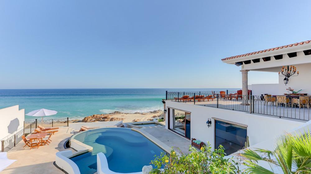 View of the pool and beach by the Casa La Laguna in Los Cabos, Baja California Sur, Mexico.
