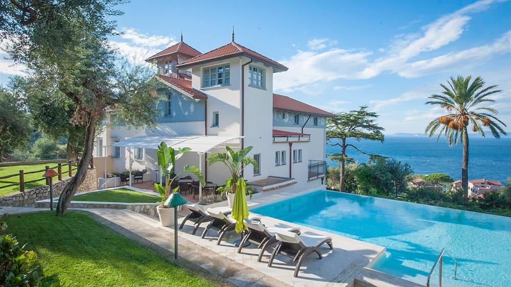 View of the pool overlooking the Bay of Naples at Stradivari villa, Amalfi Coast.